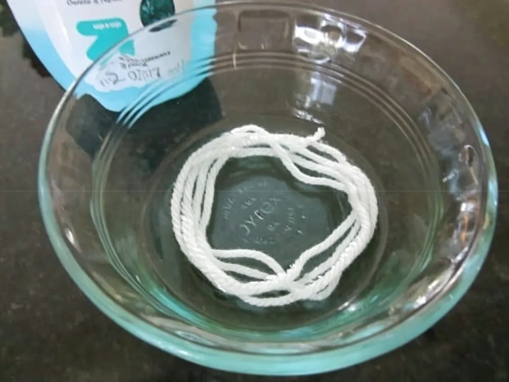 Soak the yarn in acetone